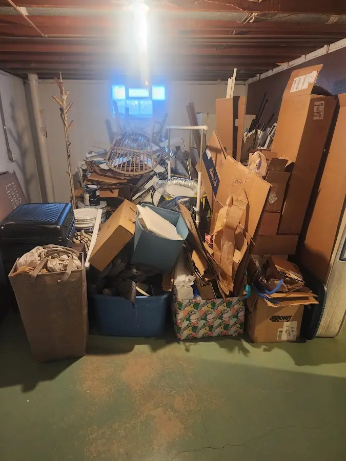 Roll-off dumpster container at job site for Construction Dumpster Rental in Omro